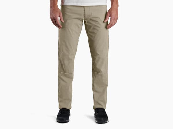 KUHL Radikl Pants in dark earth tone, showing relaxed Klassik fit with stretch panels